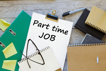 Part Time Job, text on white a4 paper. green folder