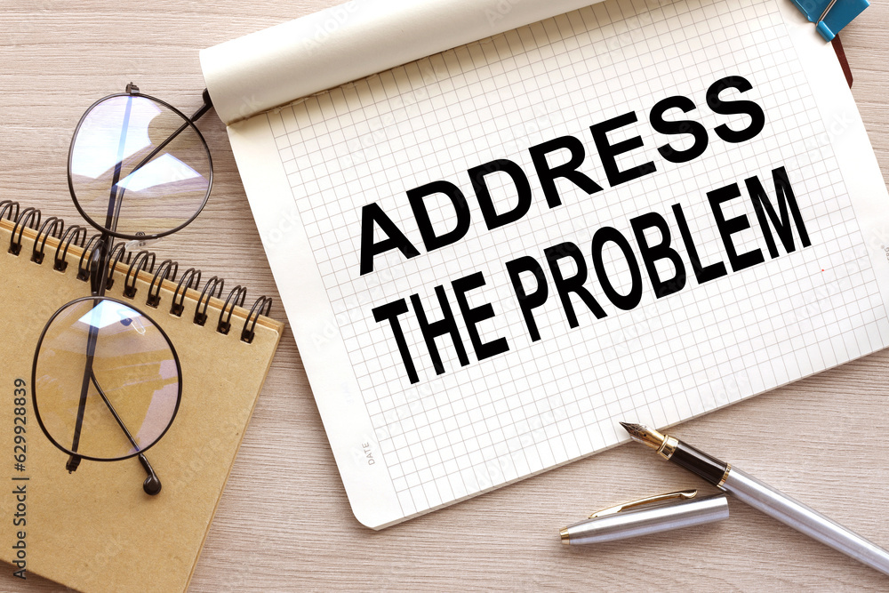 Poster top view of the text address no problem on a wooden table. glasses