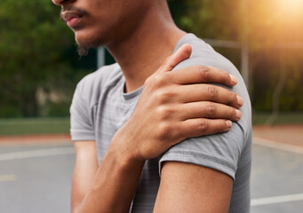 Sports, man and shoulder pain for basketball injury from workout, fitness and exercise in...