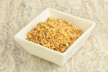 Crunched roasted peanut in the bowl