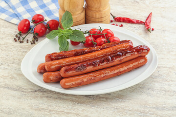 Roasted sausages in the plate