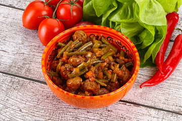 Meatball with vegetables and spices