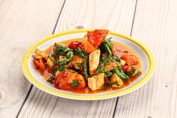 Chicken with tomato and spinach