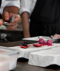 Obraz na płótnie Canvas Vertical photo of gastronomic food in pink with caviar