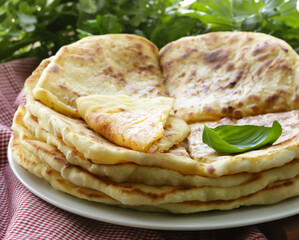 stack of fried tortillas on a plate homemade food