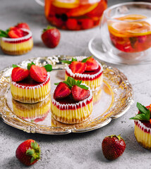 Mini strawberry cheesecake in muffin forms