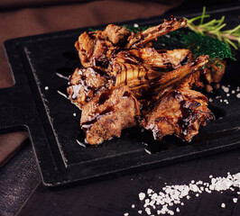 BBQ Grilled lamb chops steaks on board