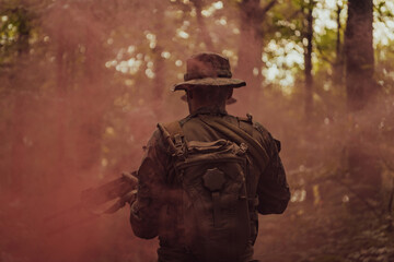 Fototapeta premium Battle of the military in the war. Military troops in the smoke