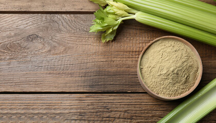 Natural celery powder and fresh stalks on wooden table, flat lay. Space for text