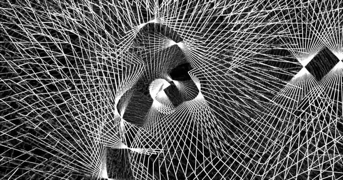 White rays of light on a dark background are intertwined, forming bizarre patterns. Animated background and club video. Endless cycle. A loop