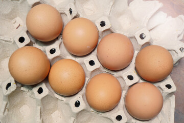 Eggs - Tray of 8 eggs Eggs. Chicken Eggs put in tray with light flare. For healthy concept, medical concept. Nutrition and diet idea concept. Health benefits of eggs.