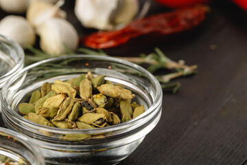 Green spice in glass bowl close up on kitchen table