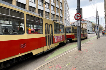 Fototapeta na wymiar Tramway passing on a cobblestone road in Bratislava, Slovakia
