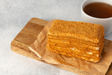 Piece of honey cake on kitchen table