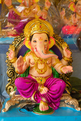 Obraz na płótnie Canvas Indian Hindu God Lord Ganesha Statues, Coated with colors and sold for Ganesh Chathurthi