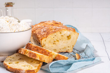 Cottage cheese bread. Trendy curd cheese baking, homemade loaf bread cheese and parmesan, high...