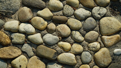 Round gravel stone tile floor