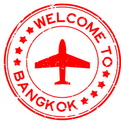 Grunge red welcome to bangkok with airplane icon round rubber seal stamp on white background