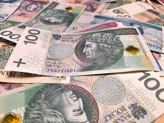 100 zloty banknotes. Polish money. Close-up. Selective focus. Background from money. Conceptual theme of salary, finance, income