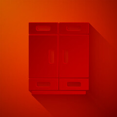 Paper cut Wardrobe icon isolated on red background. Paper art style. Vector