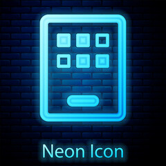 Glowing neon Graphic tablet icon isolated on brick wall background. Vector