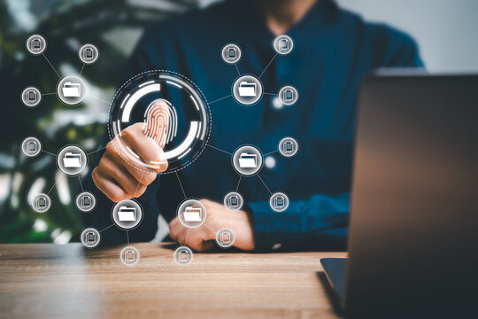 Security system and encrypting documents management concept, Businesswomen fingerprint scanner to access information and documents in an online system Highly sensitive data security and modern systems
