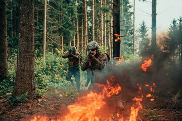 Modern warfare soldiers surrounded by fire fight in dense and dangerous forest areas