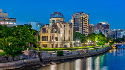 Fototapeta premium Panoramic image of Hiroshima city central with Atomic Bomb Dome at night.