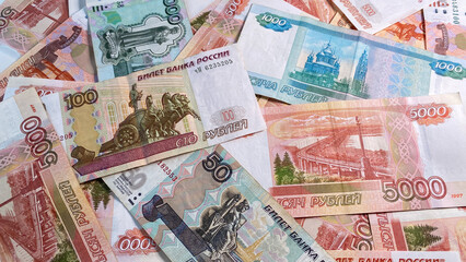 Background of money. Background of different ruble notes. Banknotes in 5000, 1000, 100 and 50 rubles. Cash banknotes. Financial business background concept.