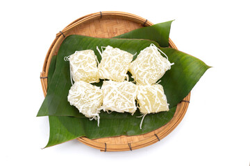 Steamed tapioca cake or cassava cake with grated coconut