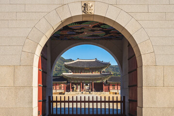 view of Heungnyemun through the main gate of Gyeongbokgung Palace, seoul. the translation of the...