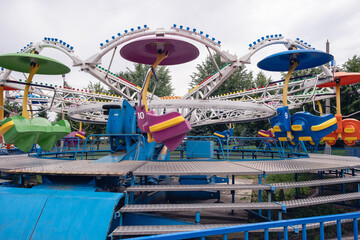 21.07.2023, Kemerovo, Russia. An amusement park with carousels for people to relax. Dangerous...