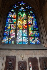 A stained glass window in the St. Vitus Cathedral, Prague