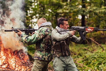 Angry terrorist militant guerrilla soldier warrior in forest