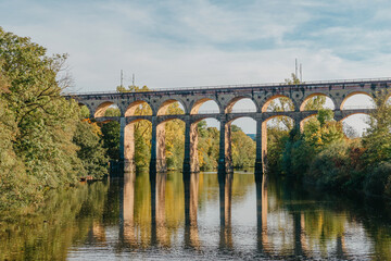 Railway Bridge with river in Bietigheim-Bissingen, Germany. Autumn. Railway viaduct over the Enz...