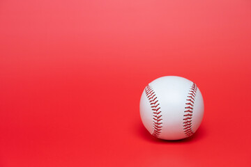 Close up baseball on red table copy space background, sport concept