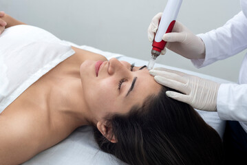 cosmetology treatment with dermapen technique for the care and beauty of the skin and health