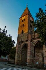 Fototapeta premium Shot of a large red brick building with a red roof, white window frames