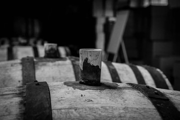 Monochrome of barrels in a wine cellar