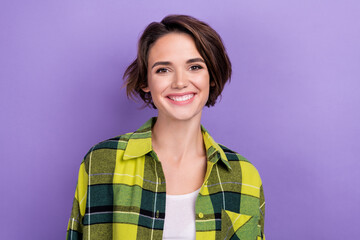 Fototapeta premium Photo of cheerful satisfied young girl beaming smile have good mood isolated on pastel violet color background