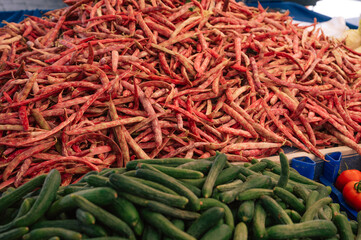 Red Beans sale in the traditional farm Turkish market, a counter filled with fresh fruits