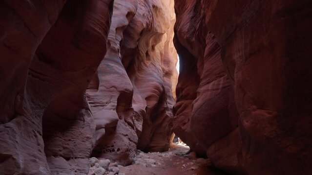 Narrow passage inside a rocky passage Hiking Wire Pass on  to Buckskin Gulch in Utah, USA