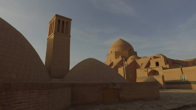 Wind towers used as a cooling system for water reservoir Ardestan Iran