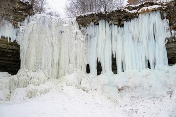 Scenic view of a frozen waterfall - Powered by Adobe