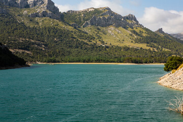 Obraz premium Hiking holidays Mallorca, Spain. Beautiful picture with landscape of Serra de Tramuntana mountains in the island of Majorca in Mediterranean sea. Paradise for bikers. Adventure travel.