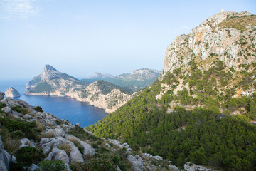 Fototapeta na wymiar Hiking holidays Mallorca, Spain. Beautiful picture with landscape of Serra de Tramuntana mountains in the island of Majorca in Mediterranean sea. Paradise for bikers. Adventure travel.