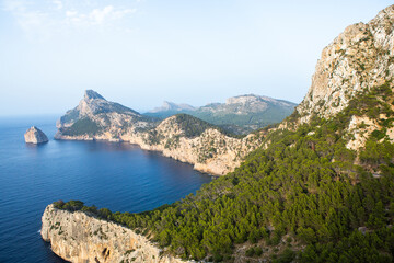 Fototapeta na wymiar Hiking holidays Mallorca, Spain. Beautiful picture with landscape of Serra de Tramuntana mountains in the island of Majorca in Mediterranean sea. Paradise for bikers. Adventure travel.