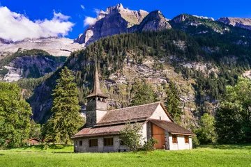 Gordijnen Switzerland scenic places. picturesque  Kanderseg village , view of old church surrouded by impressive Alps mountains. Canton of Bern © Freesurf