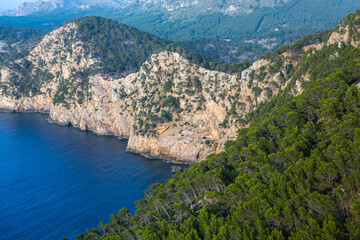 Obraz premium Hiking holidays Mallorca, Spain. Beautiful picture with landscape of Serra de Tramuntana mountains in the island of Majorca in Mediterranean sea. Paradise for bikers. Adventure travel.