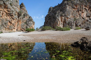 Hiking holidays Mallorca, Spain. Beautiful picture with landscape of Serra de Tramuntana mountains in the island of Majorca in Mediterranean sea. Paradise for bikers. Adventure travel.